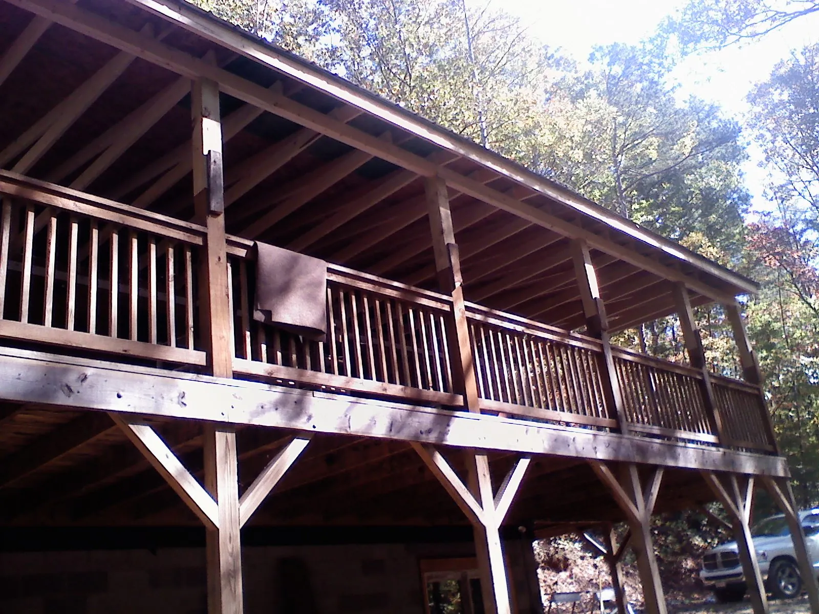Timber framing under a new elevated porch and deck — Roof Leak Repair in Croswell by Roofing Brothers